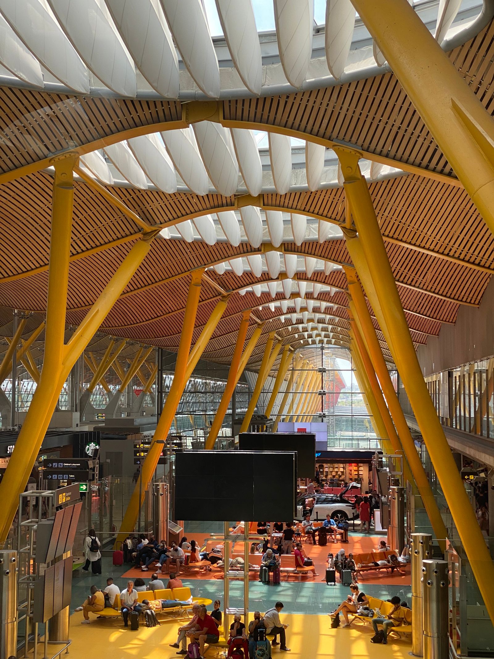 Modern Airport Terminal — The group chat stays live across every border you cross.