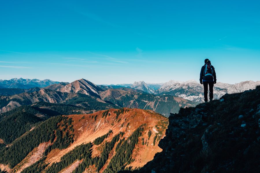man in black jacket standing on rock formation under blue sky — Every run of What’s My IP? is free — no credits, no paywall, no expiring trial.