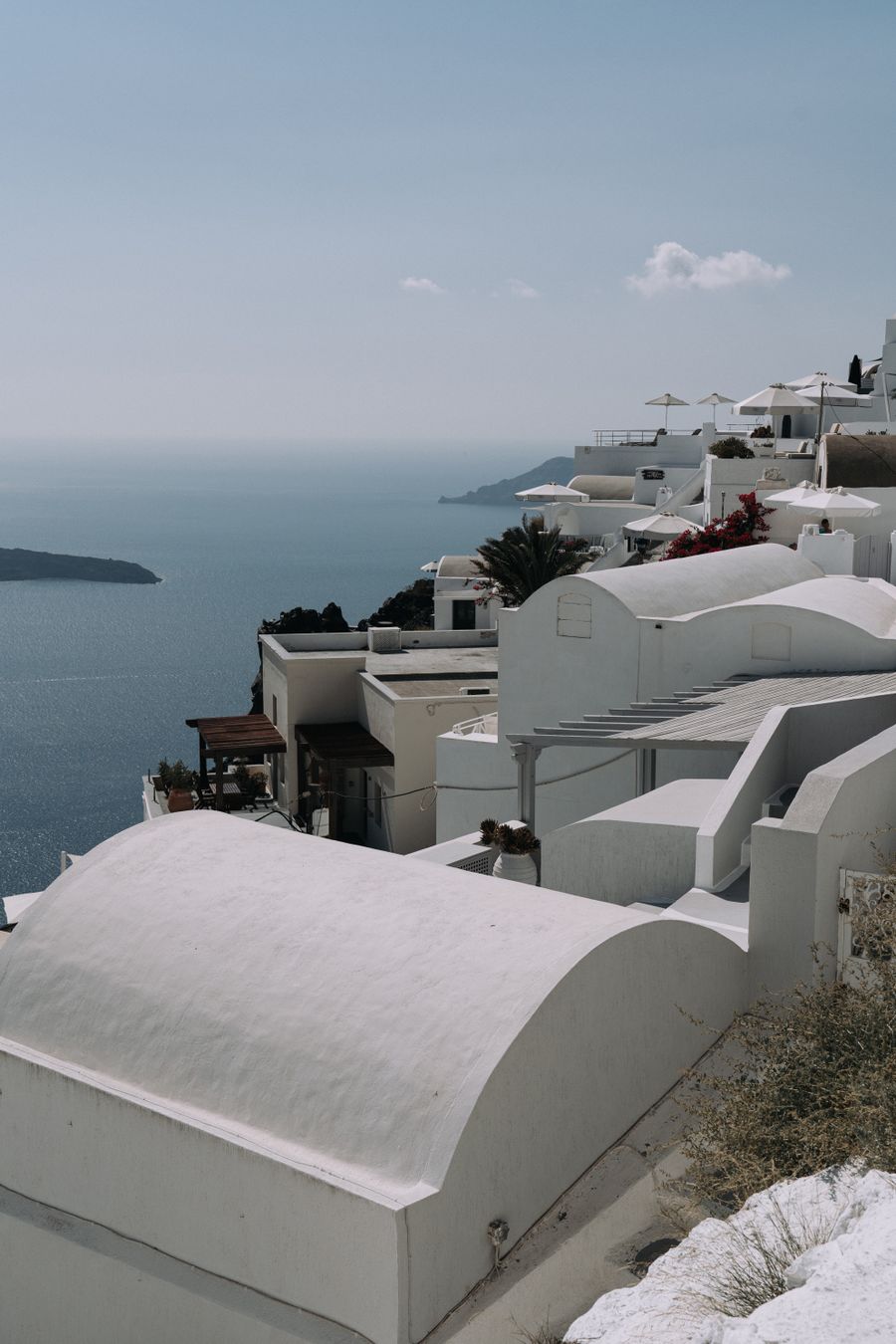 white concrete buildings near the sea