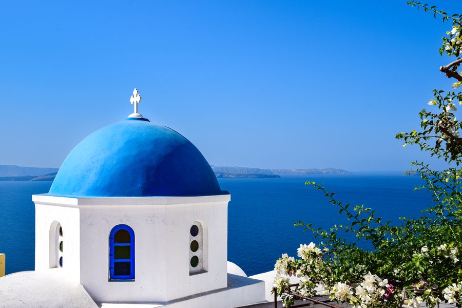 dome of church on sea coast in greece — The food tour: every recommendation looked up on the spot.