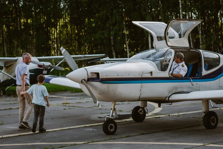 father with son walking near light aircraft — What’s My IP? works for anonymous visitors — answers first, signup never forced.