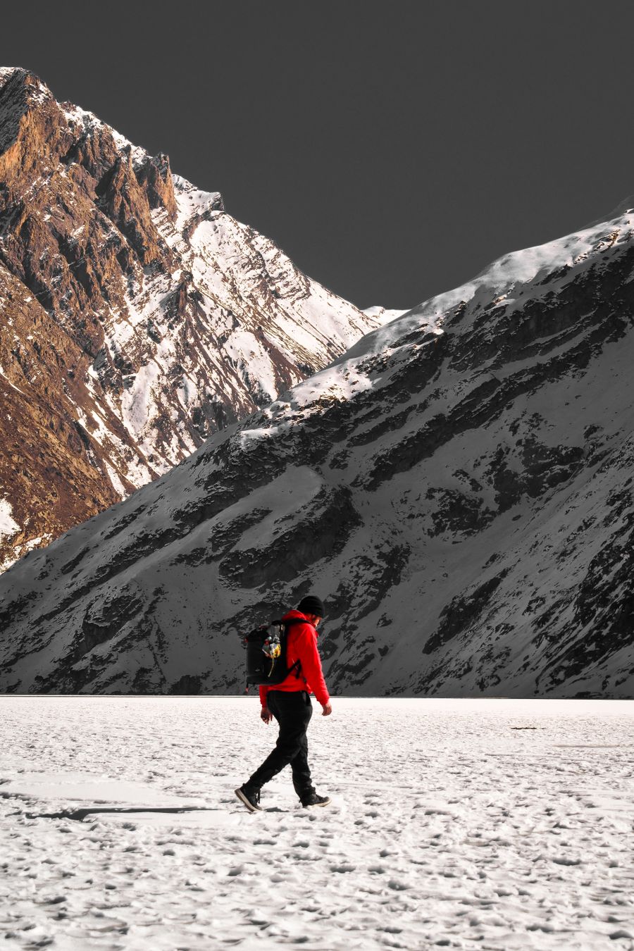 man in a mountain valley covered with snow — Connection Quality Grader remembers, so repeat travelers barely type.