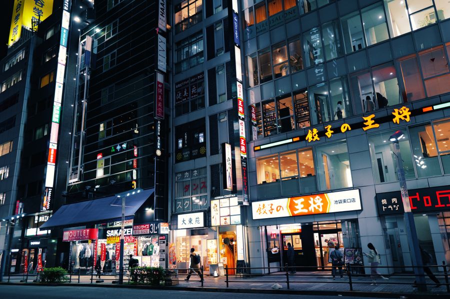 buildings and people in city at night — eSIM Installation Guide computes the moment you submit — no queues, no waiting room.