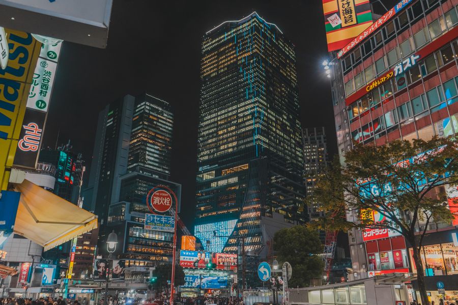 vibrant neon cityscape of tokyo at night — The FAQ below Low-Data Alert answers the six questions everyone asks first.