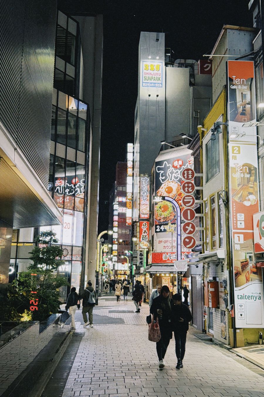 vibrant night street scene in shibuya tokyo — The answer is computed from your inputs against current plan and coverage data.