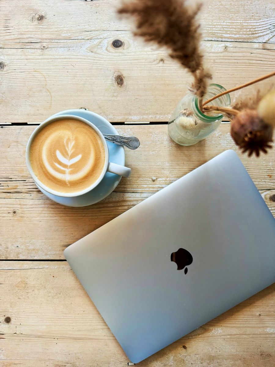 cozy cafe workspace with laptop and latte art — Dual-SIM Setup Guide accepts your trip details and hands back a clear recommendation.