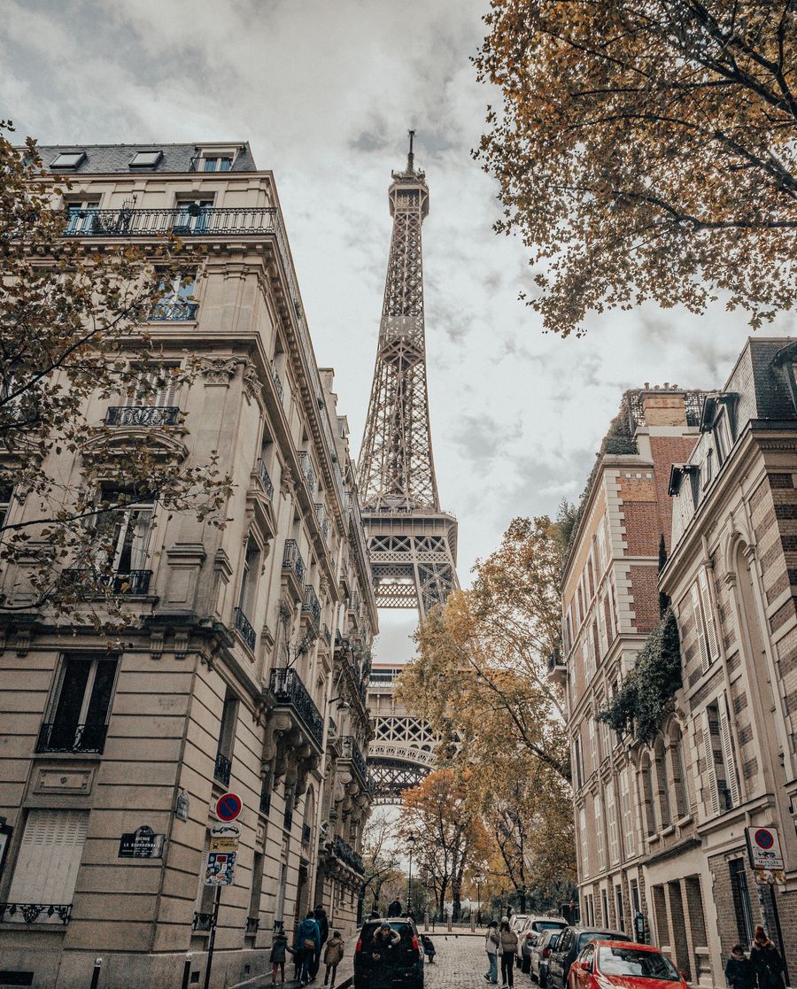eiffel tower — The departure board flips: gate found, lounge located, all on the eSIM.