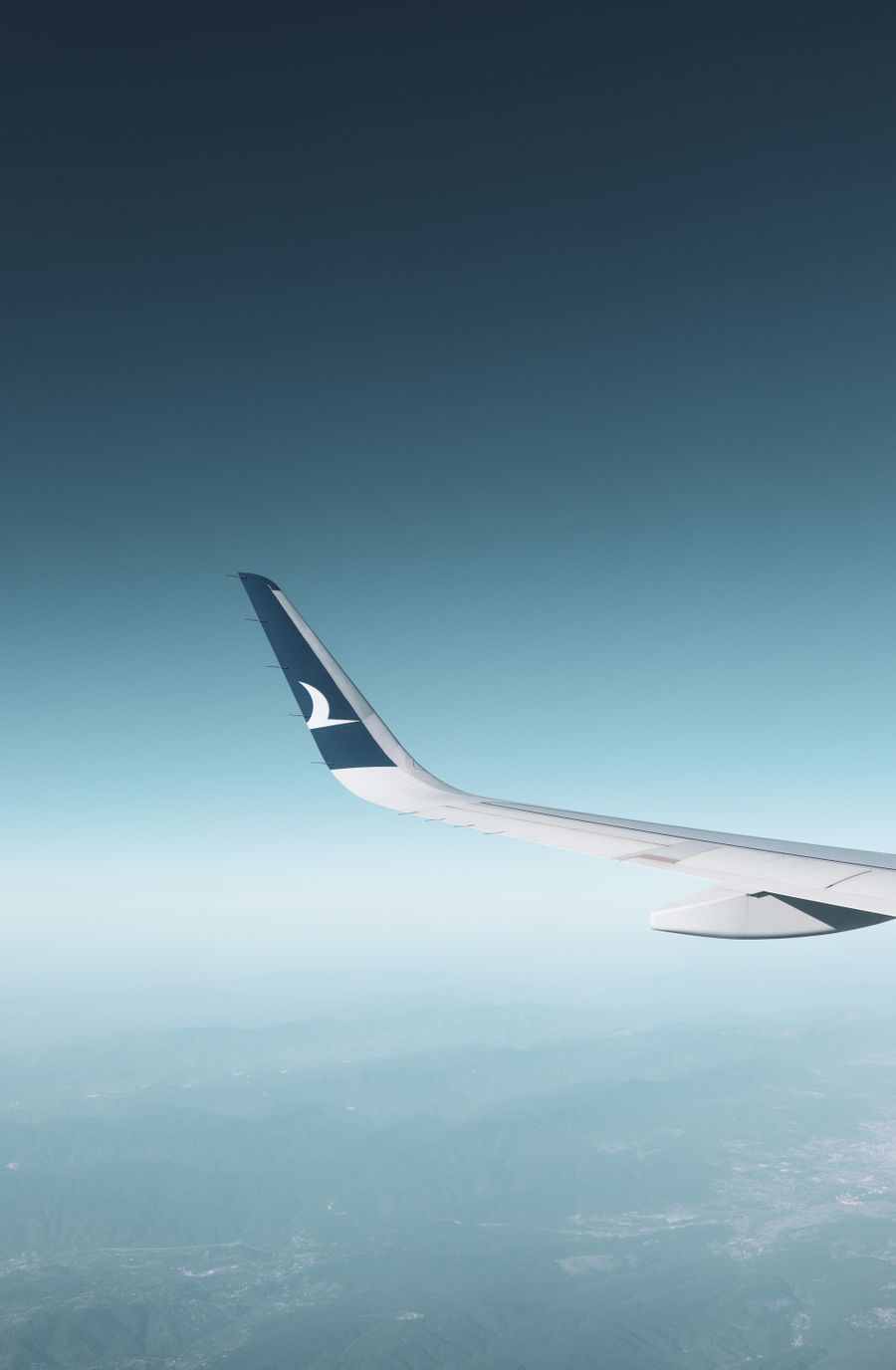 scenic view from airplane window in flight — Data-Saver Setup computes the moment you submit — no queues, no waiting room.