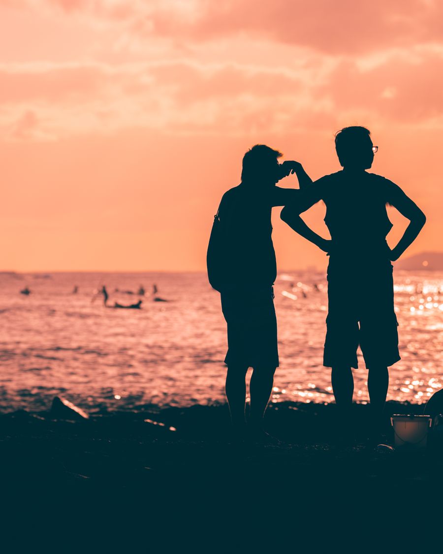 silhouette of 2 men and woman standing on beach during sunset — Every run of eSIM Troubleshooter is free — no credits, no paywall, no expiring trial.