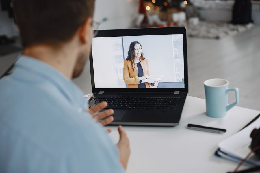 man conferring online with woman — Best Network by City computes the moment you submit — no queues, no waiting room.