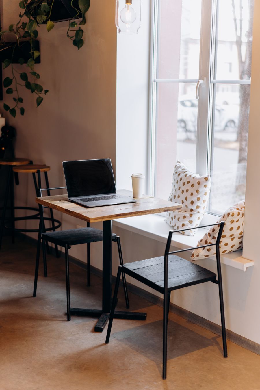 black laptop computer on wooden table — The rental desk handshake: confirmation email open, license photo ready.