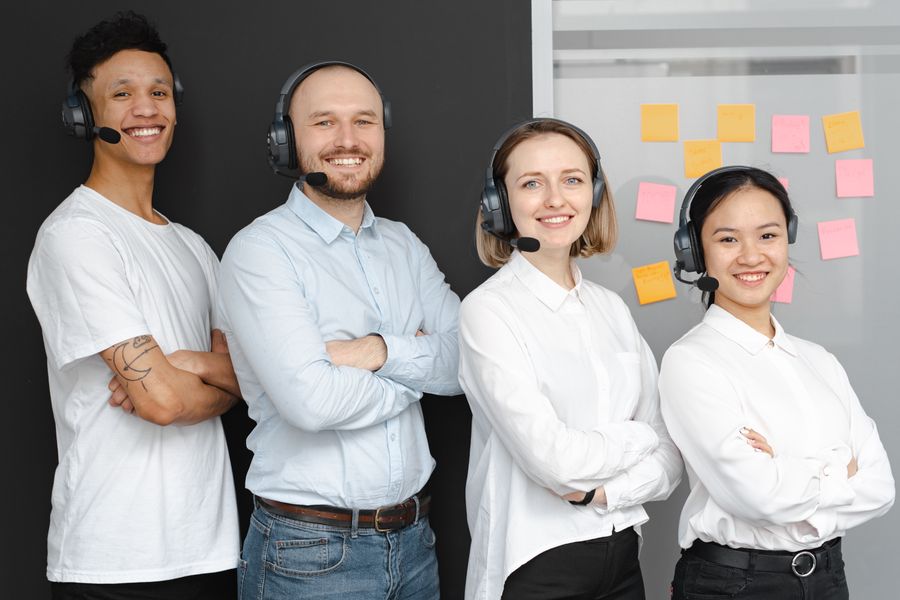 a group of people wearing headsets