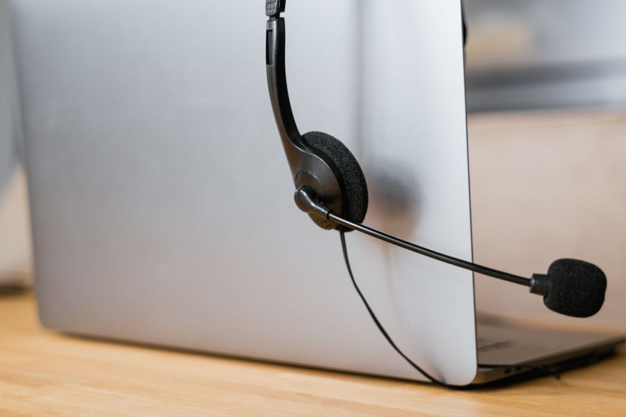 close up shot of headphones hanging on a laptop — Find My Plan runs in your browser session — nothing sensitive stored against you.