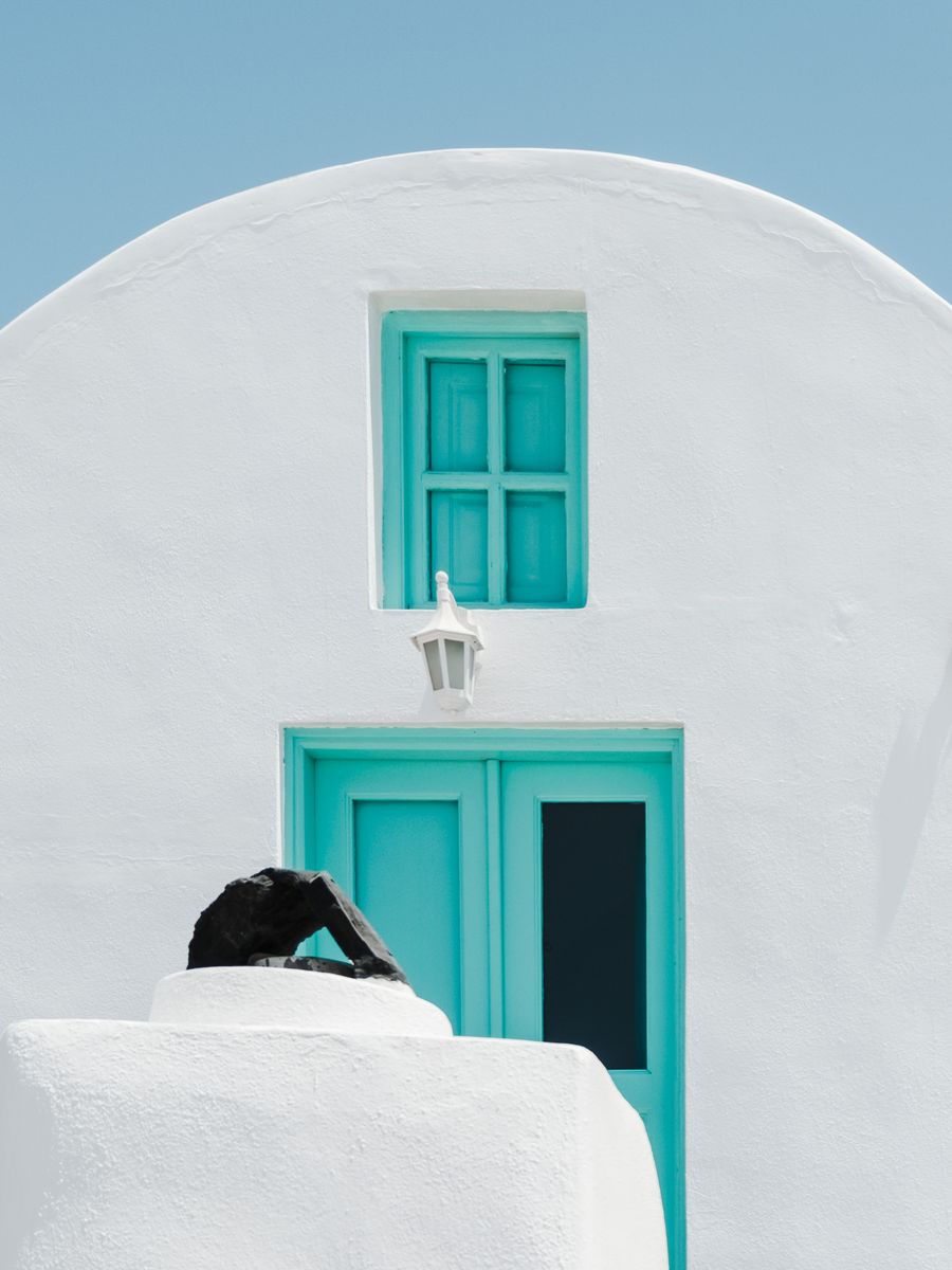 turquoise door and window on white concrete wall — Low-Data Alert: built for the airport sprinter and the careful planner alike.